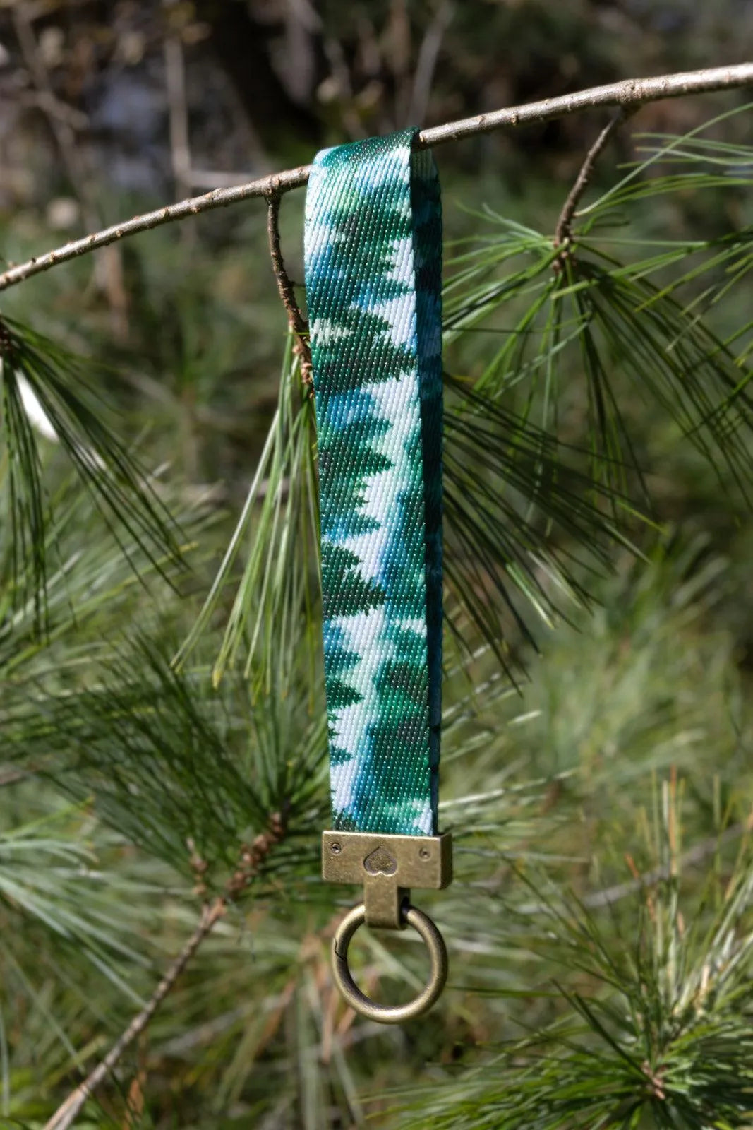 Evergreen Explorer Wristlet Keychain on dog — pet accessory close-up | Cutie Paw Co.